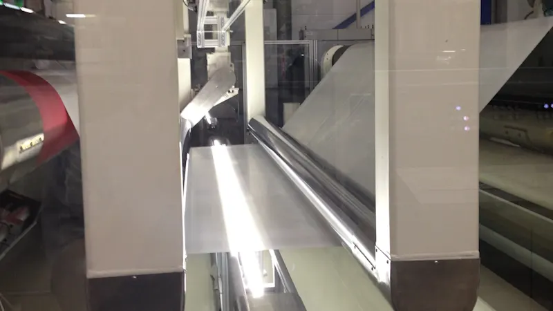 Film inspection system in a biaxial line