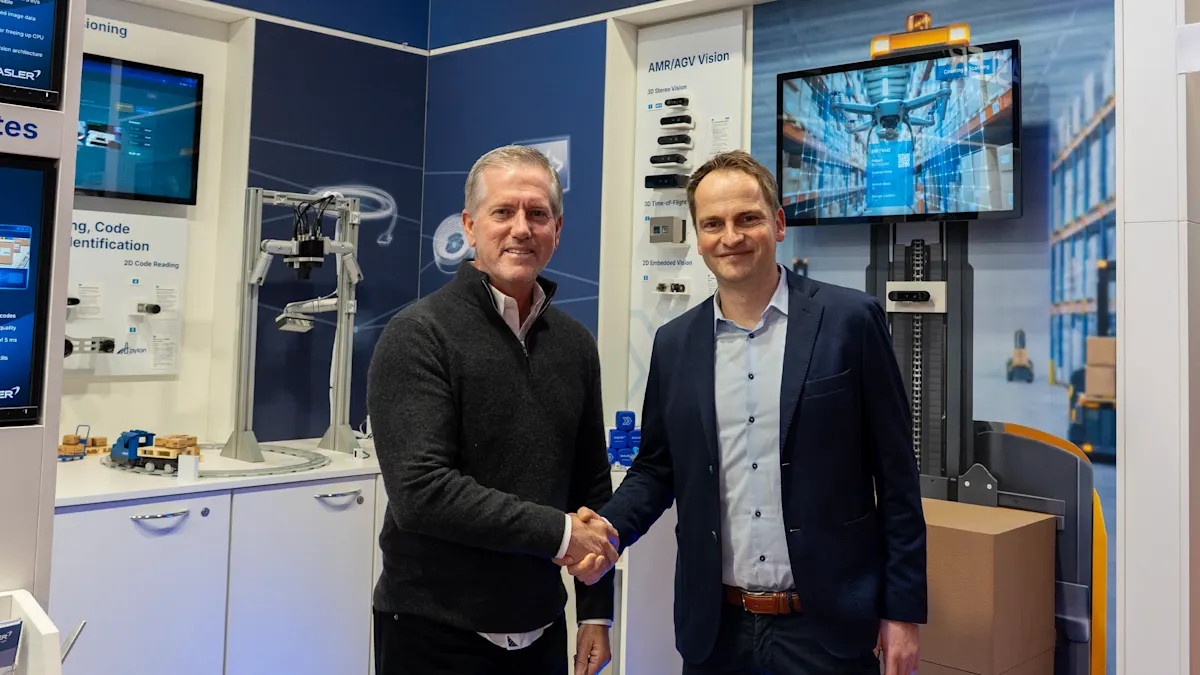 Handshake between Basler AG and Orbbec: Mike McSweeney, Vice President of Sales at Orbbec (left) and René von Fintel, Executive Director Business Management at Basler AG(right)